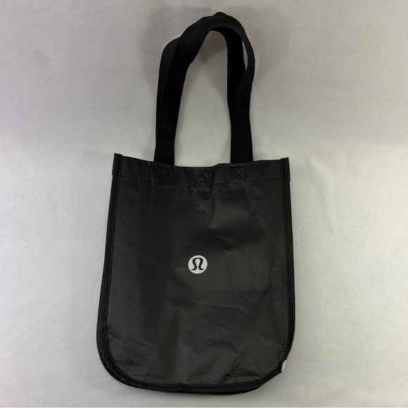 lululemon athletica Handbags - Lululemon Small Black Reusable Tote White Logo Sides Shopping Bag 12” 9” 5”